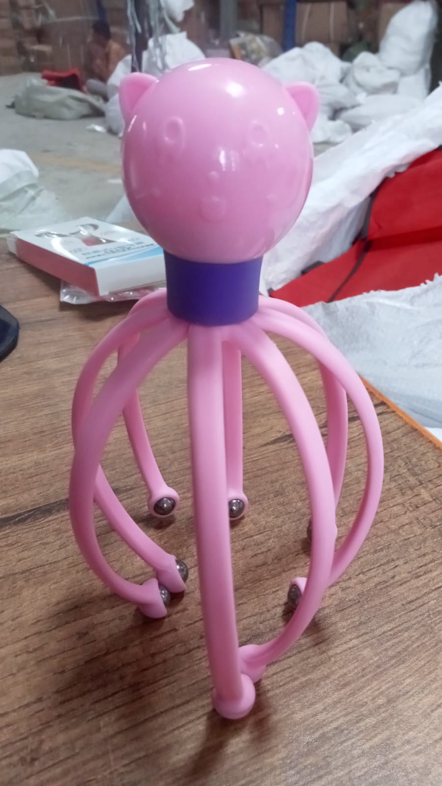 Octopus-shaped therapeutic scalp massager for relaxation and stress relief Octopus-shaped therapeutic scalp massager for relaxation and stress relief